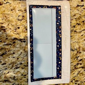 Tory Burch long zip wallet/clutch with tassel.